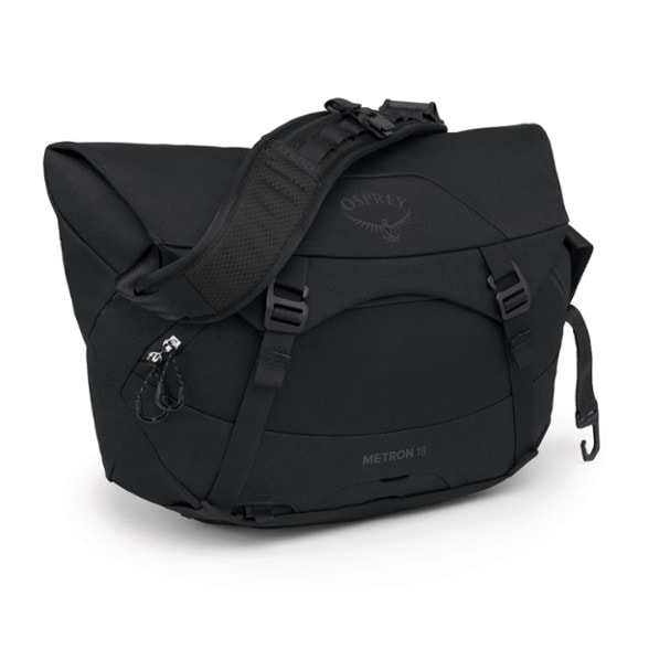 Osprey Metron 18 messenger bag with raincover in city street setting