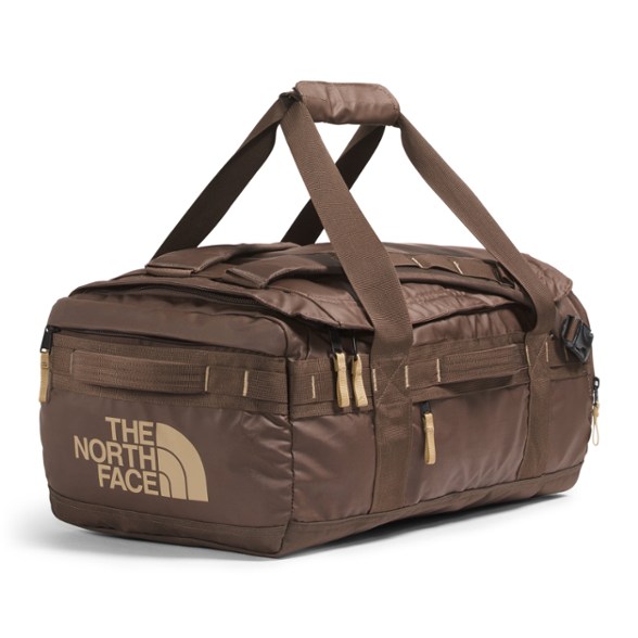 A sleek black Voyager Pro 42L duffel bag seen from the front, showcasing its minimalist design and secure-zip pockets, perfect for a modern traveler.