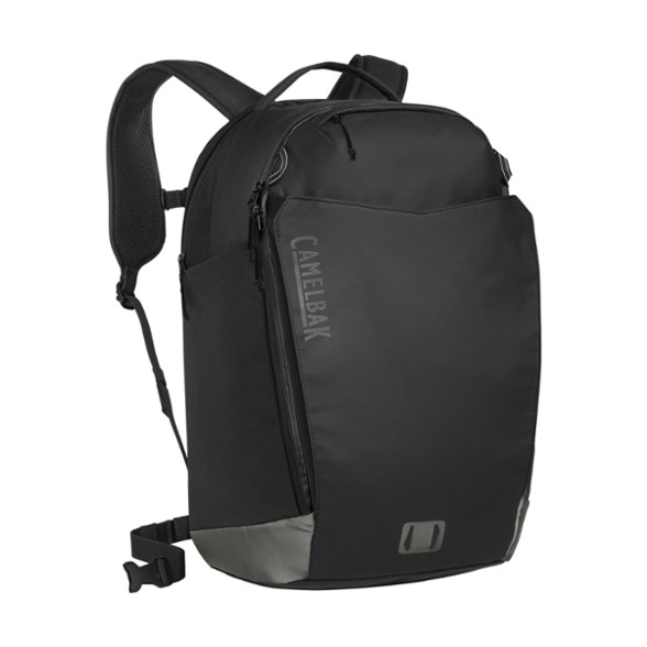 CamelBak H.A.W.G. Commute 30L backpack opened showing laptop compartment and organization pockets