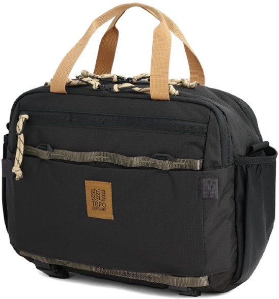Front view of the Traverse Travel Crossbody Bag showing padded laptop compartment
