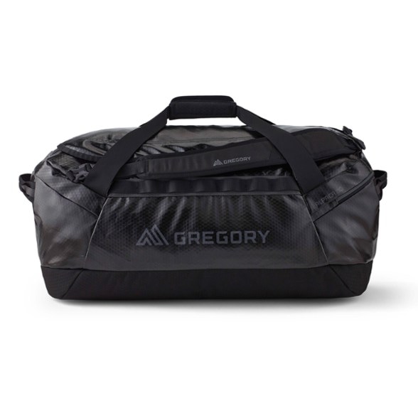 Side view of the waterproof adventure bag with backpack straps on hiking trail