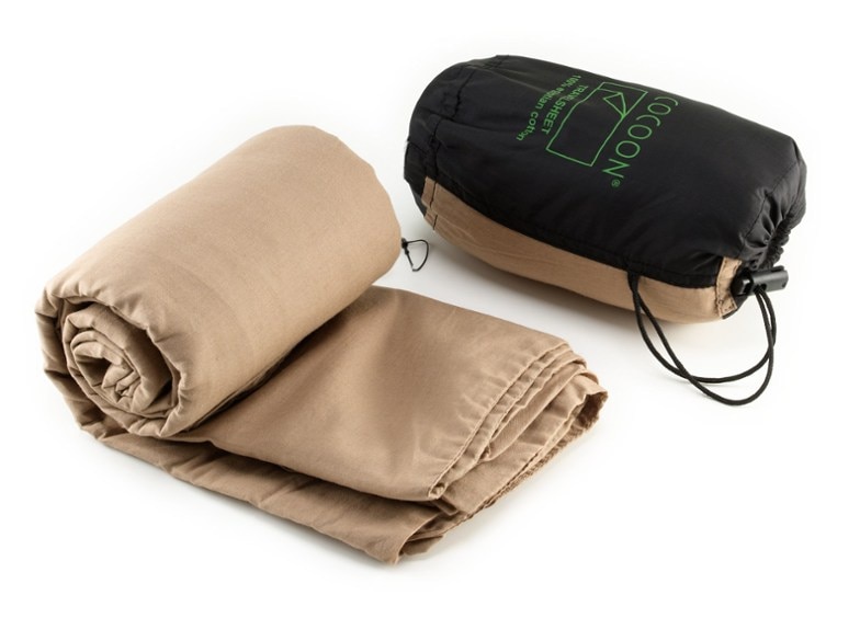 Luxurious Egyptian cotton travel sheet folded, showcasing its smooth texture