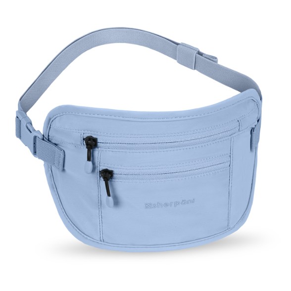 Sherpani concealed waist wallet shown tucked beneath clothing for hidden security