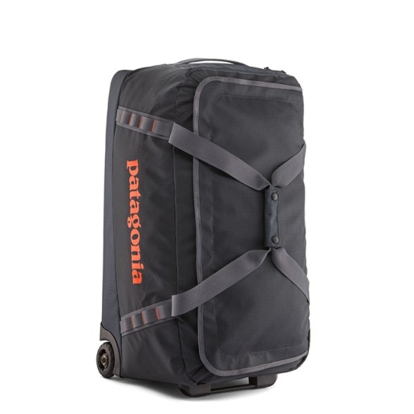 Recycled impact reducing travel gear bag featuring sturdy wheels and large storage capacity