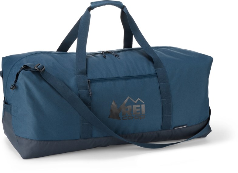 Roadtripper 100L duffel bag packed full, showing spacious interior and side pocket