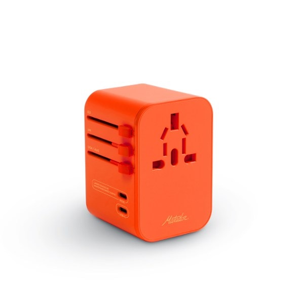 Global travel adapter with 6 output ports, including USB-C and USB-A