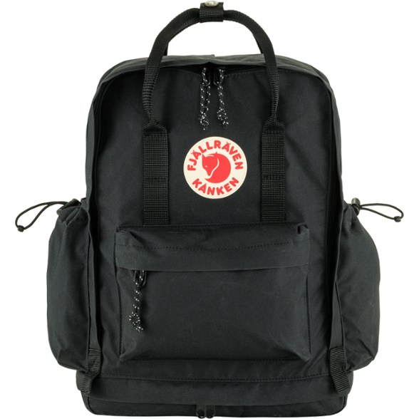 Fjallraven Kanken Outlong Pack on a hiking trail, highlighting its spacious design for outdoor use.