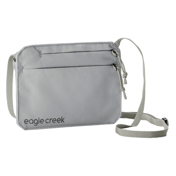 Adjustable neck wallet for travel worn under a shirt, showing discreet RFID protection