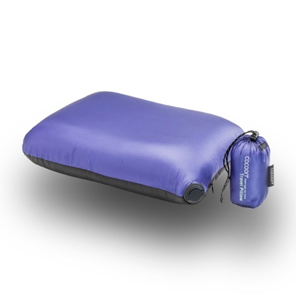Hyperlight travel pillow in use on airplane seat, showing neck support