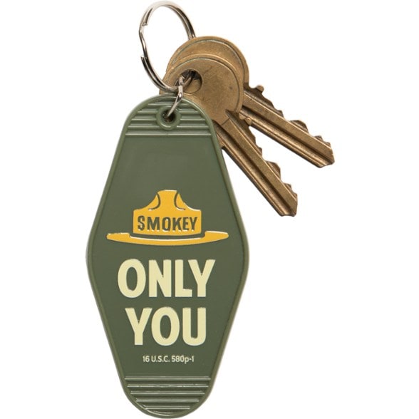 Eco-Friendly Adventure Keychain displayed against a natural backdrop, highlighting its durable materials.