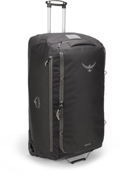 Side angle of Osprey GlidePro wheeled duffel showing rugged wheels and reinforced corners for travel durability