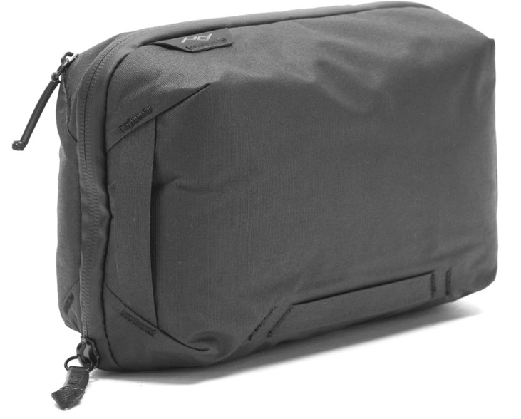 Peak Design Tech Pouch with gadgets organized clearly inside, showcasing its large capacity and efficient layout.