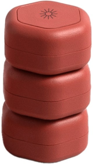 Overhead view of three Cadence skincare capsules labeled for cleanser, moisturizer, and sun care, shown in travel bag.
