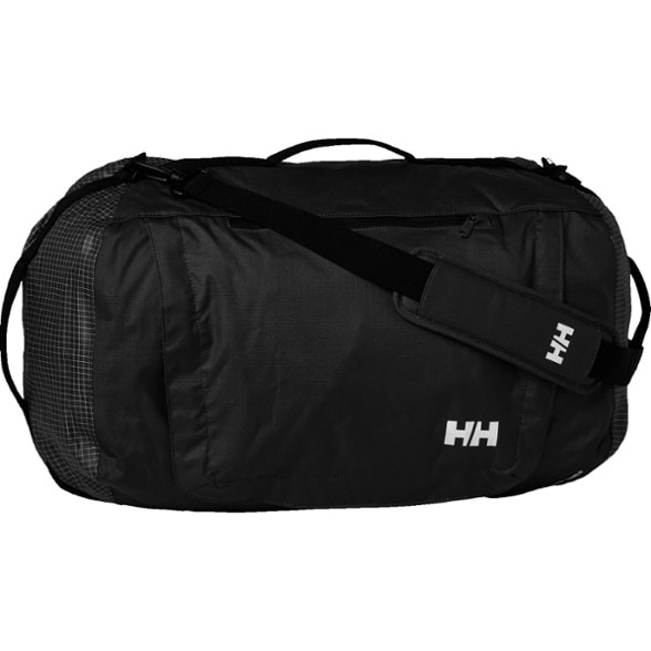 Helly Hansen 50L duffel bag with a waterproof design on a beach outing.