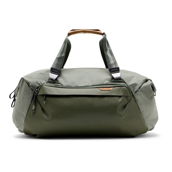Side view of waterproof weekend duffel with carry handles and external pockets