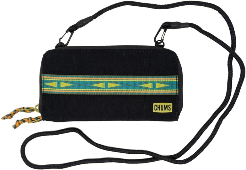 Voyager Canvas Travel Sling Wallet worn across the body, showcasing its compact design and secure fit.