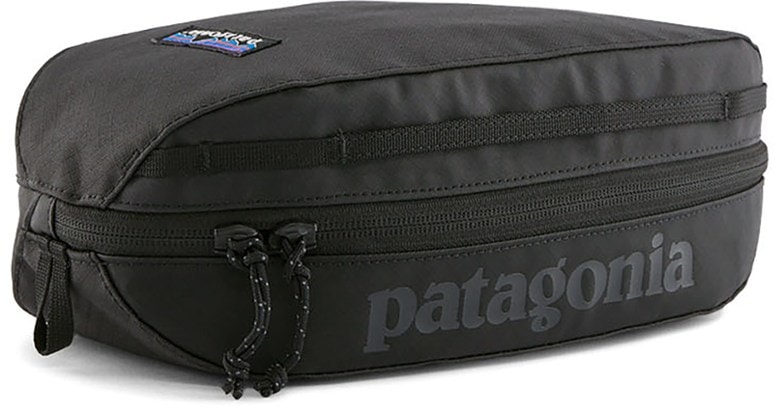 Patagonia Black Hole Cube in use, showcasing its organizational features for toiletries.