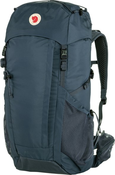 Top view of the adjustable hiking backpack with rain cover showing spacious lid and bungee storage