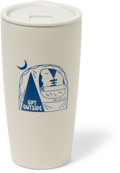 MiiR stainless steel travel tumbler with coffee in a cozy café setting