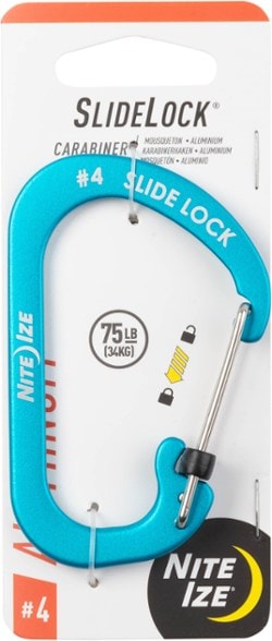 Close-up of SlideLock aluminum carabiner clipped to a backpack strap