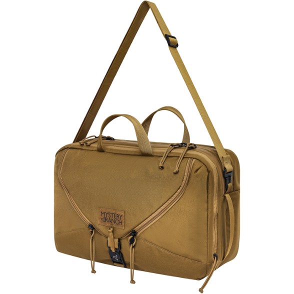 Front-facing view of 18L laptop backpack in briefcase mode, highlighting expandable compartment and rugged exterior.
