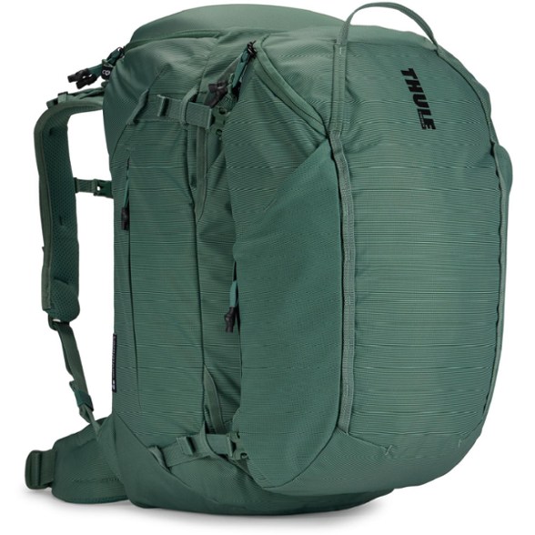 Front view of the Thule Landmark 60L women's travel pack with the detachable daypack attached, showcasing its sleek design and ready-for-travel appearance.