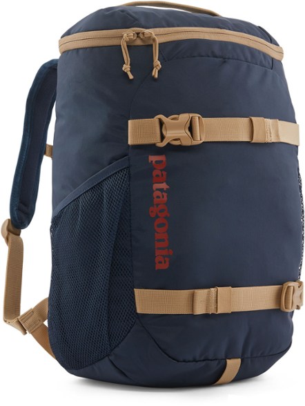 Patagonia Refugito 18L Kids Daypack showcased on a hiking trail