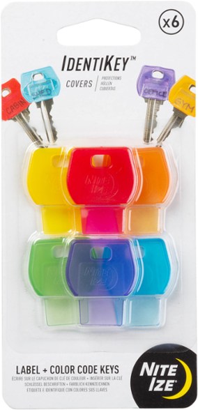 Top-down view of 6 color coded key covers arranged by shade for home organization