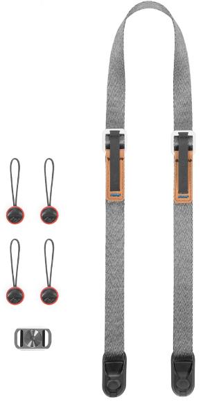 Close-up of the Peak Design quick connect camera strap attached to DSLR with anodized aluminum hardware