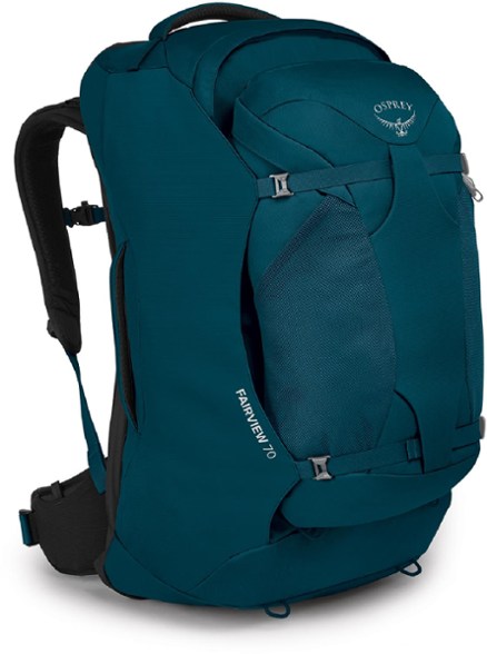 Osprey Fairview 70 women's travel backpack in a scenic mountain setting