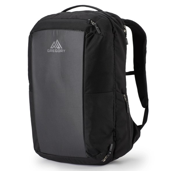 Front view of the Voyager Pro 30L travel backpack in a sleek gray finish, showcasing its clean lines and accessible front pocket.