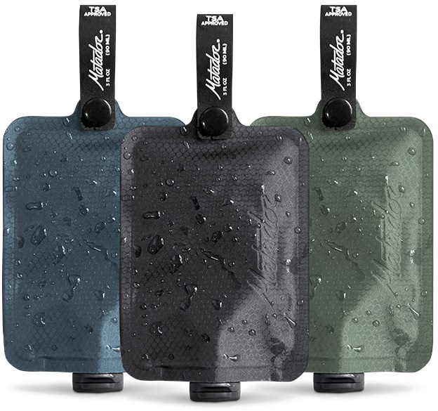 Matador FlatPak travel toiletry bottles set of three, showcasing their compact size and lightweight design.