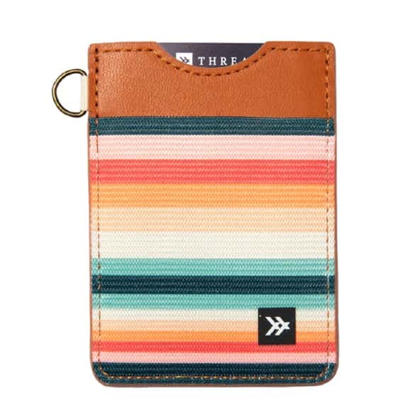 Front view of the slim leather wallet with cards inserted, highlighting the RFID blocking feature.