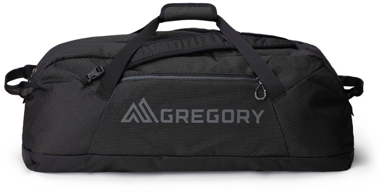 Front angled view of TrailMax backpack-style duffel bag loaded with camping gear