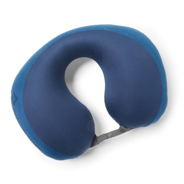 Close-up of SkyNest inflatable pillow fully inflated in a plane seat with visible neck support