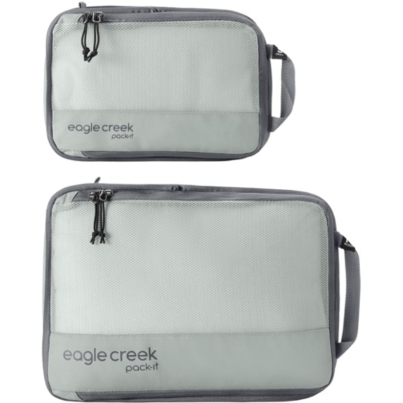 Eagle Creek compression packing set showing the small and medium cubes in a travel bag.