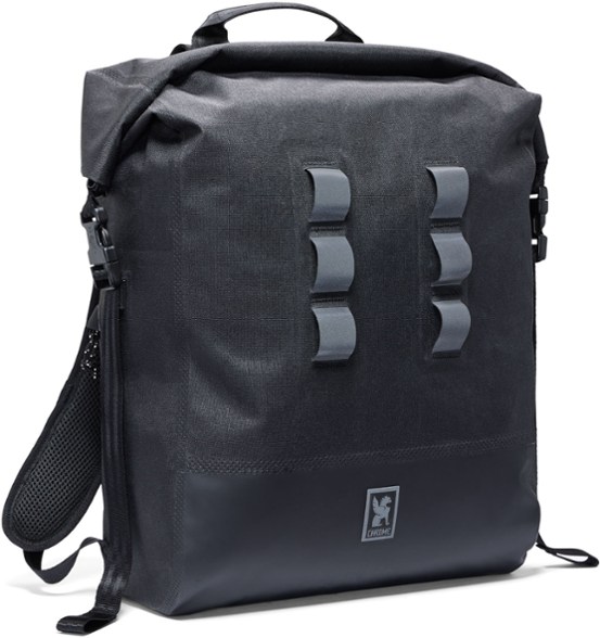 Urban Ex 30L Commuter Backpack held in hand, showing waterproof roll-top feature.