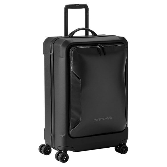 Tarmac Pro 29-inch spinner suitcase rolling through airport terminal