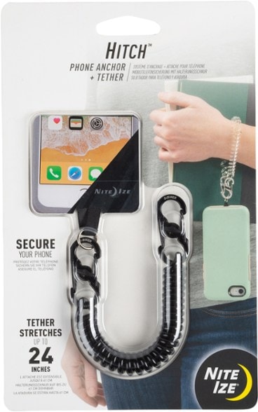 Secure phone anchor attached to a backpack strap during a hike