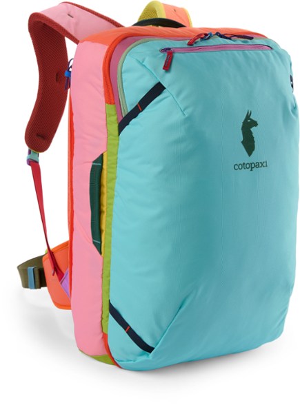 Side view of Cotopaxi Allpa 42L Del Día travel backpack showing water bottle pocket