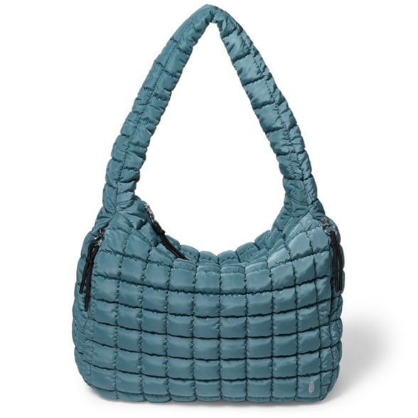 FP Movement quilted gym tote being carried by a woman at the gym