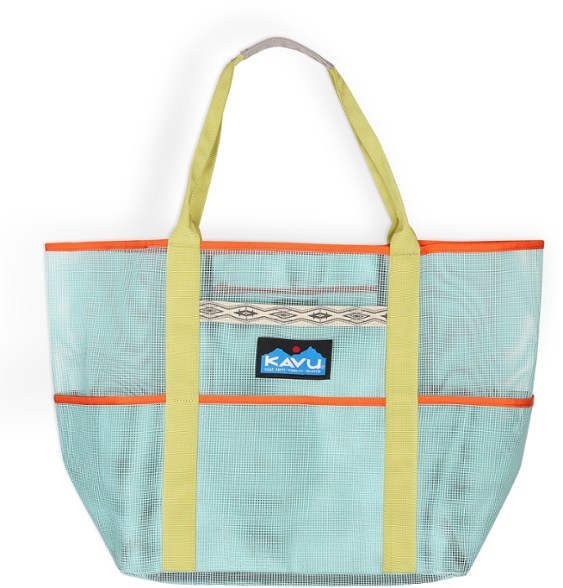 KAVU Mesh Master Tote held by poolside, showcasing pockets and sand-resistant fabric
