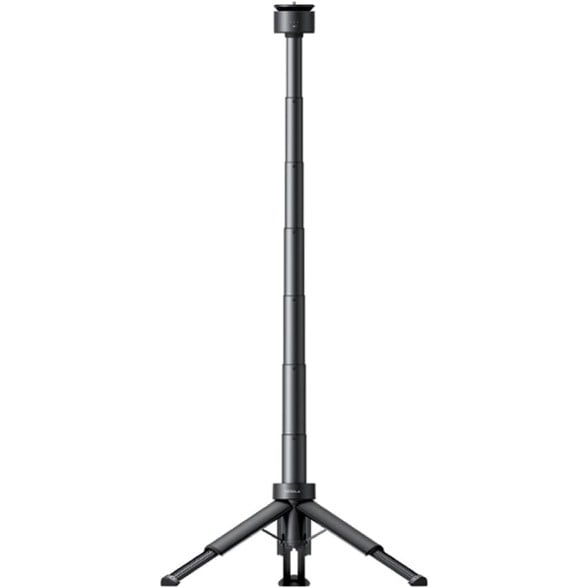 The Anker Nebula power bank tripod set up at a campsite, offering a perfect viewing angle.