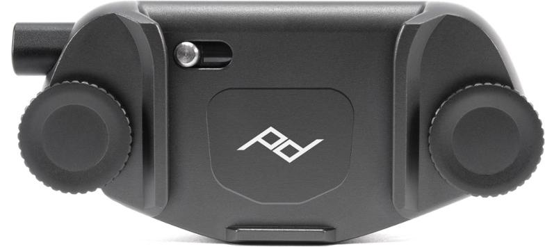 Capture 3.0 camera clip mounted on backpack strap with DSLR attached