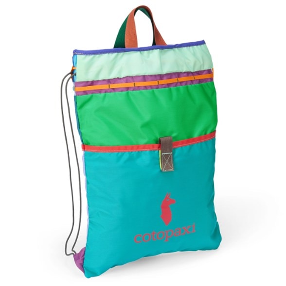 Cotopaxi Del Día colorful drawstring backpack worn casually over one shoulder