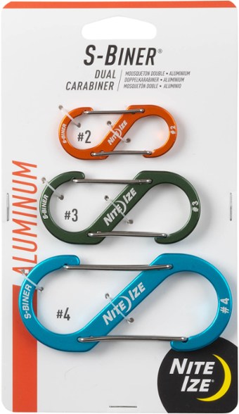 Nite Ize S-Biner 3-Pack in assorted colors, photographed on hiking gear