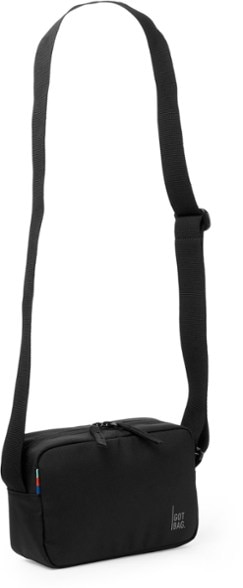 Sustainable crossbody bag worn diagonally across chest during city travel