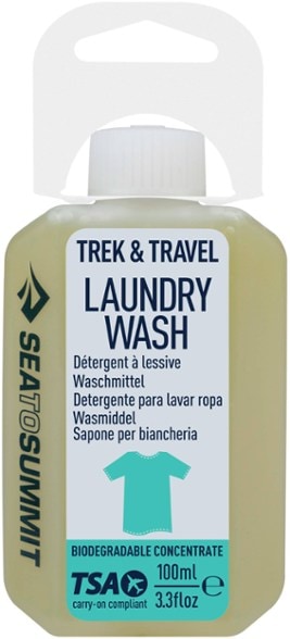 Front view of PackFresh portable laundry wash bottle on camping gear