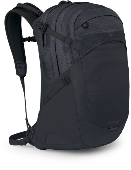 Osprey Tropos 32 pack standing upright, showcasing its sleek design and integrated kickstand.