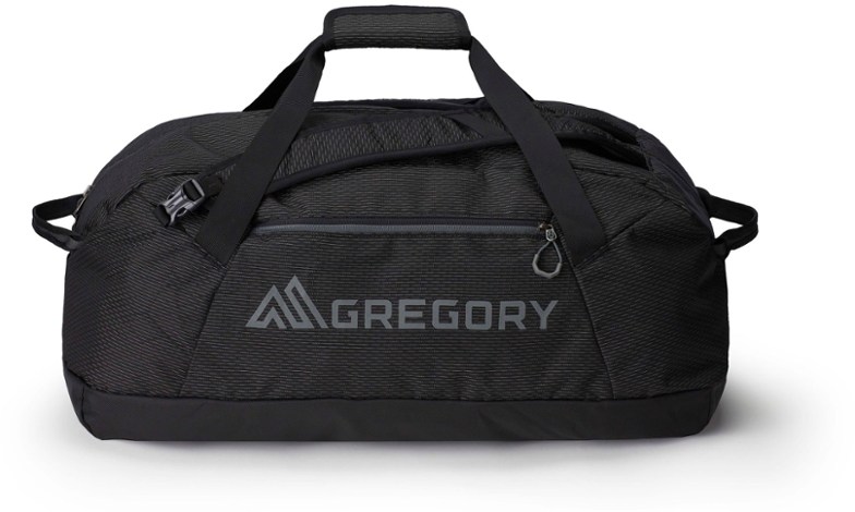 Gregory Supply 65L duffel bag with backpack straps in outdoor setting